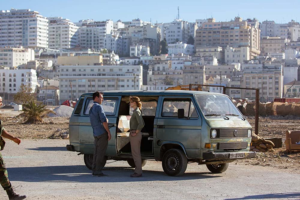 Jon Hamm, Rosamund Pike, and Ben Affan in Beirut (2018)