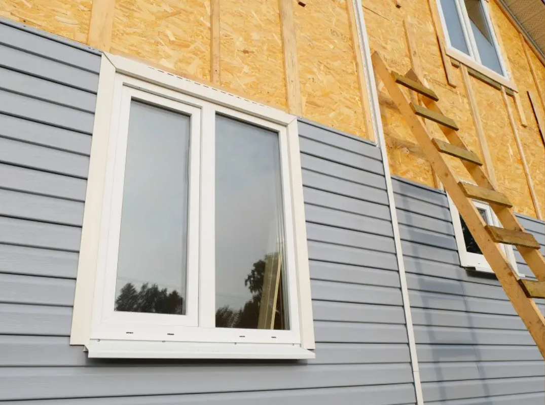 Contemporary home with mixed material siding