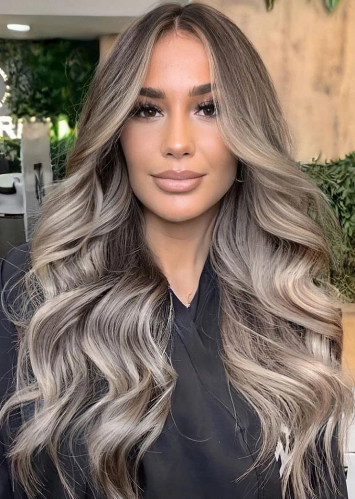 Long wavy healthy hair with ash blonde balayage