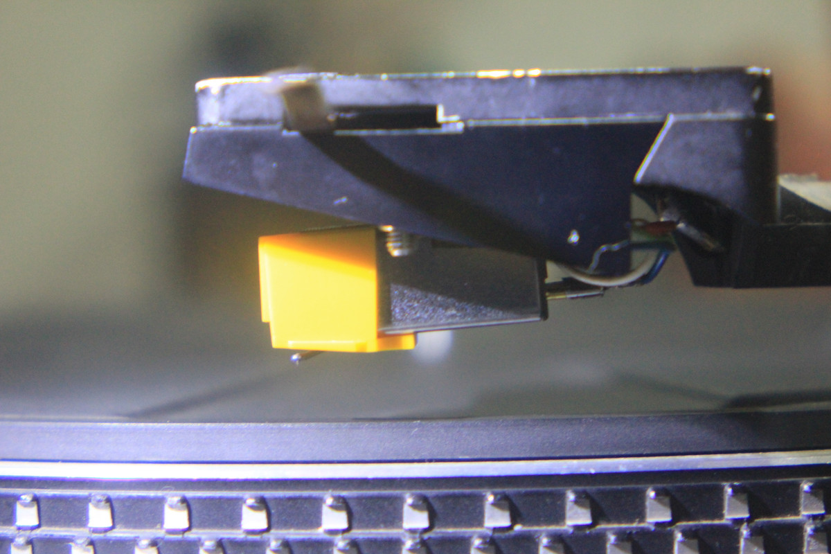 altura de la capsula con la palanca levantada