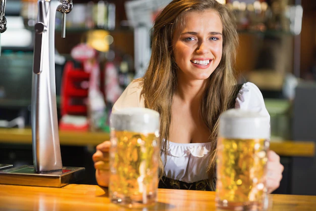 smiling-oktoberfest-barmaid-with-beer-13339-168217.webp