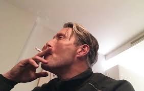 mads smoking cigarette