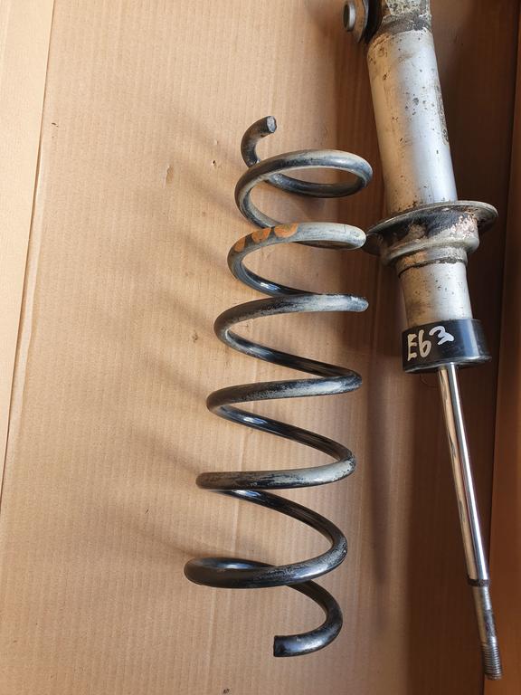 Пружина задняя