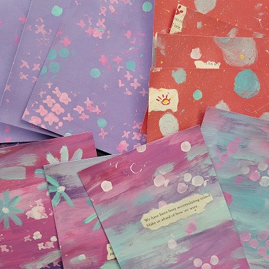 A close-up of painted postcards