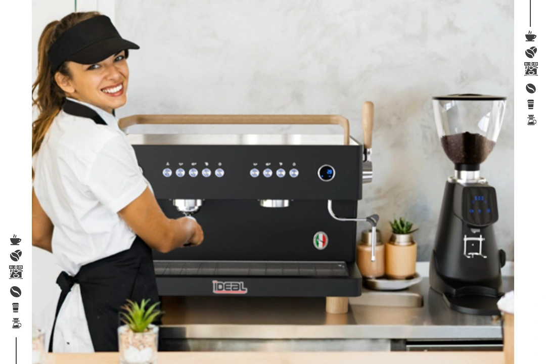 Smiling barista using espresso machine