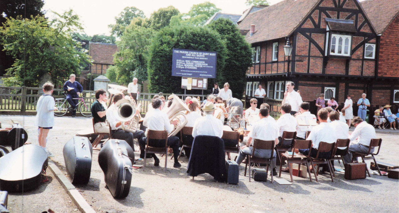 Beaconsfield Brass preparing to play at Remembrance Sunday, conducted by Trevor