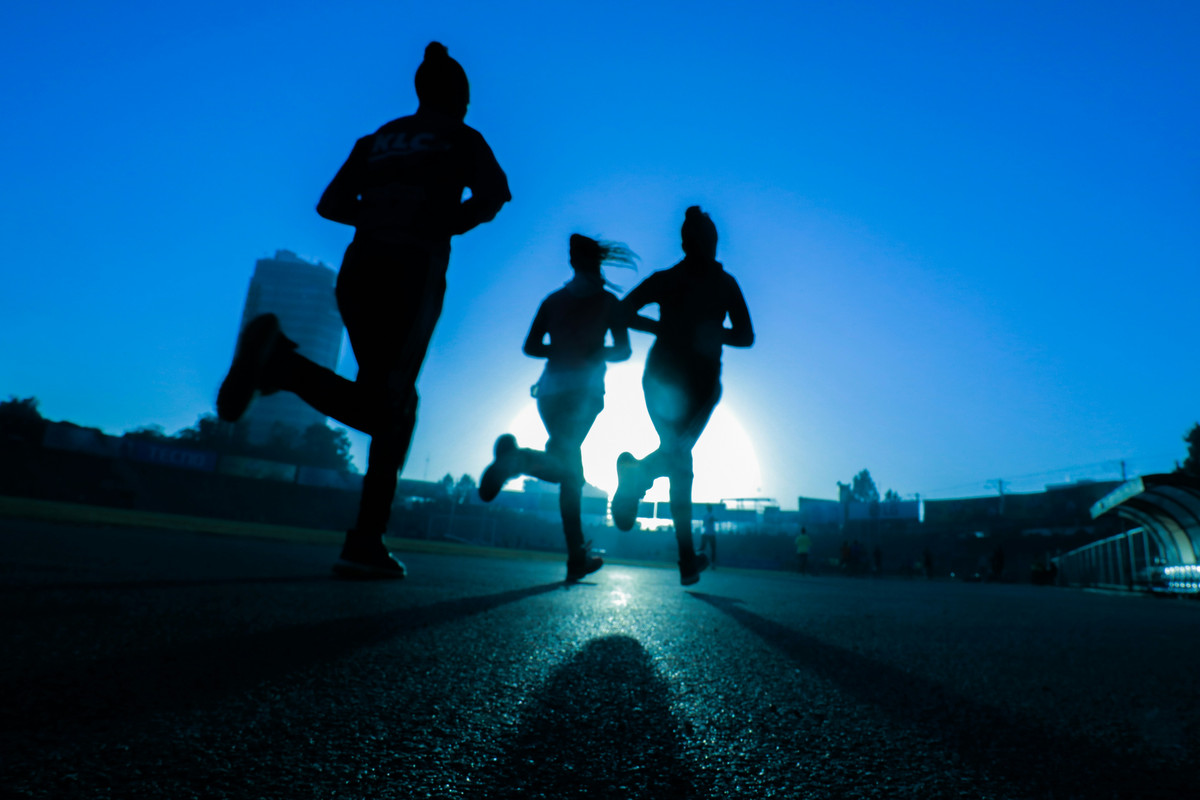 Person running on a trail