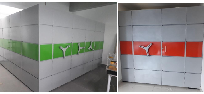 Finished installation of manual mobile archives in a corporate library, sleek grey metal finish.