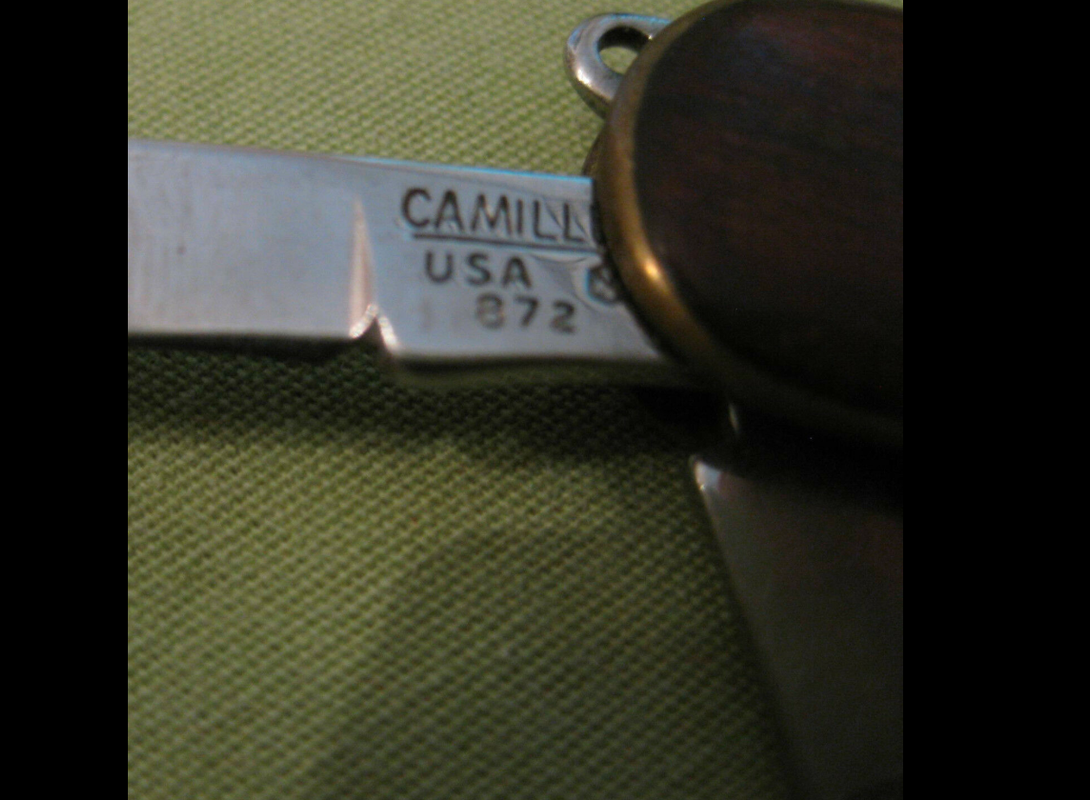 Camillus wood finish four