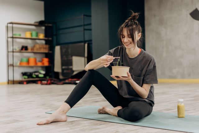 a woman adopting a healthy lifestyle by eating healthy and staying hydrated to maintain a healthy skin barrier 