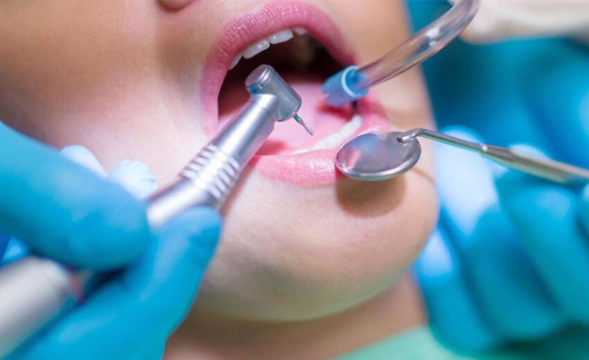 Dental Surgeon at Work