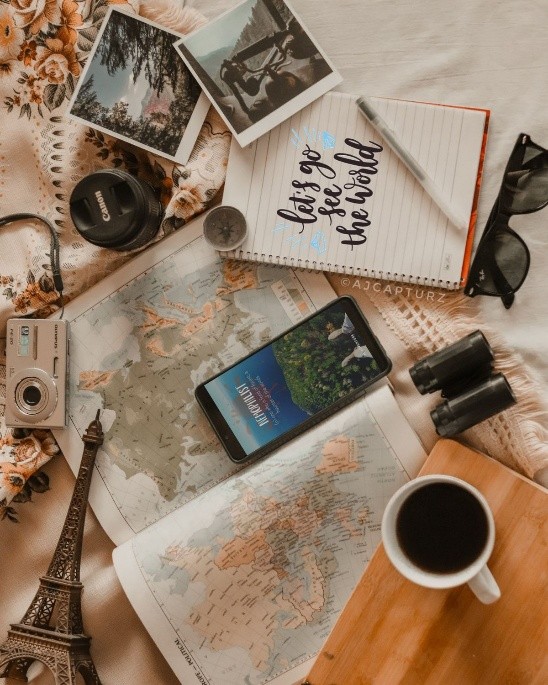 Let's go see the world — travel journal flat lay