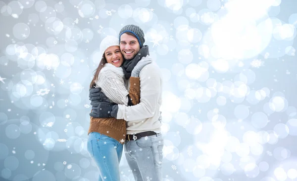 depositphotos-53896013-stock-photo-young-winter-couple-against