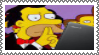 Lenny with his fingers up to his mouth, looking at a laptop