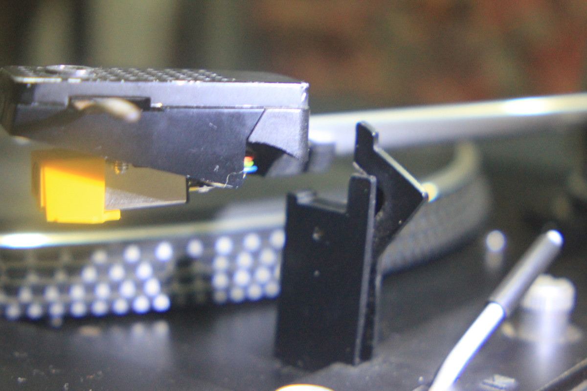 altura brazo de regreso al soporte