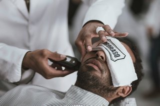 A person getting a professional shave