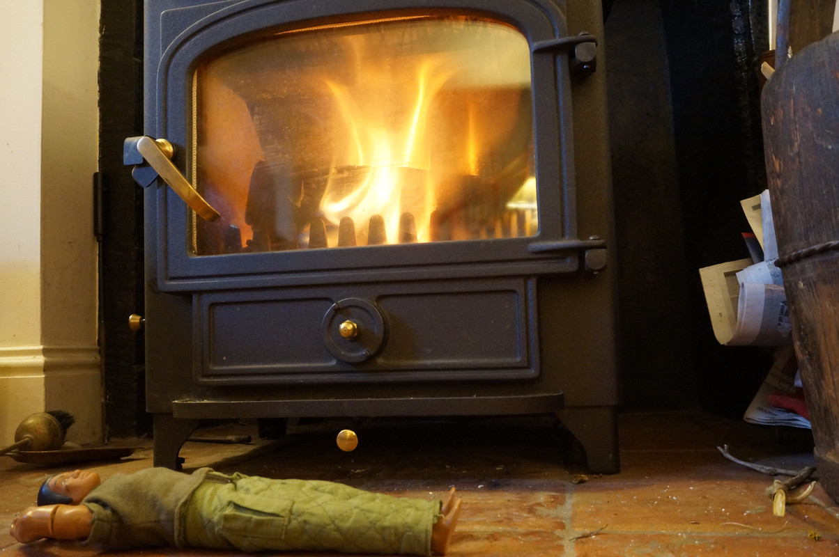 Joe relaxes in front of the Fire Stove and doing other relaxing things. 8-E8-A5-B12-DE1-C-416-D-9-A46-03509-D911821