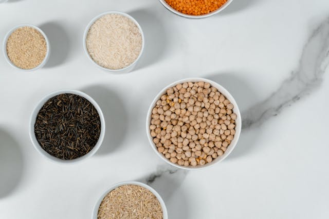 different bowls containing different lentils and chickpeas