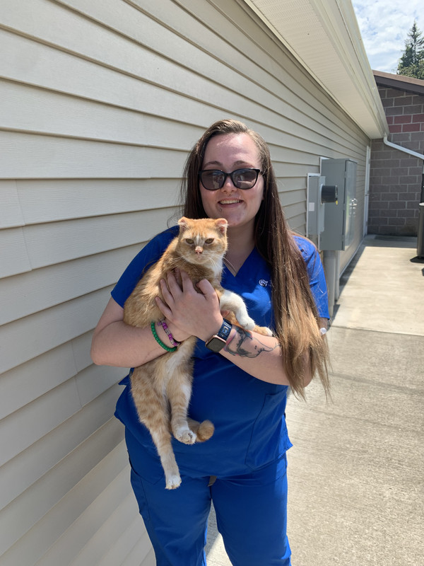 Kiana with her cat, Rollo.