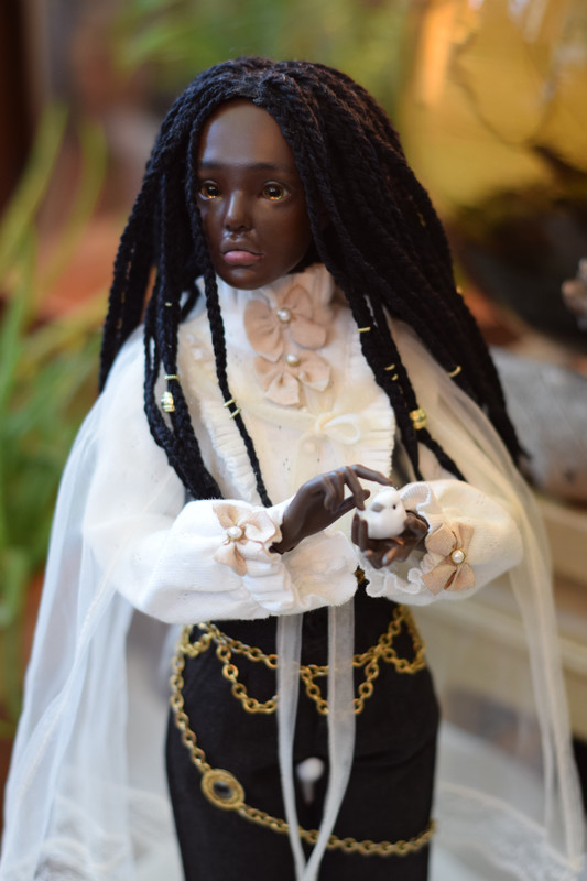 Ophelia holding a small white bird