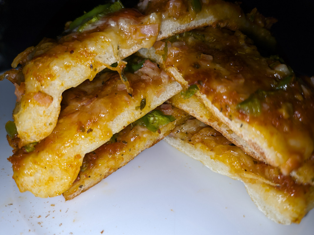 Pizza de hamon lliork y pimientoh de tuhmuertoh