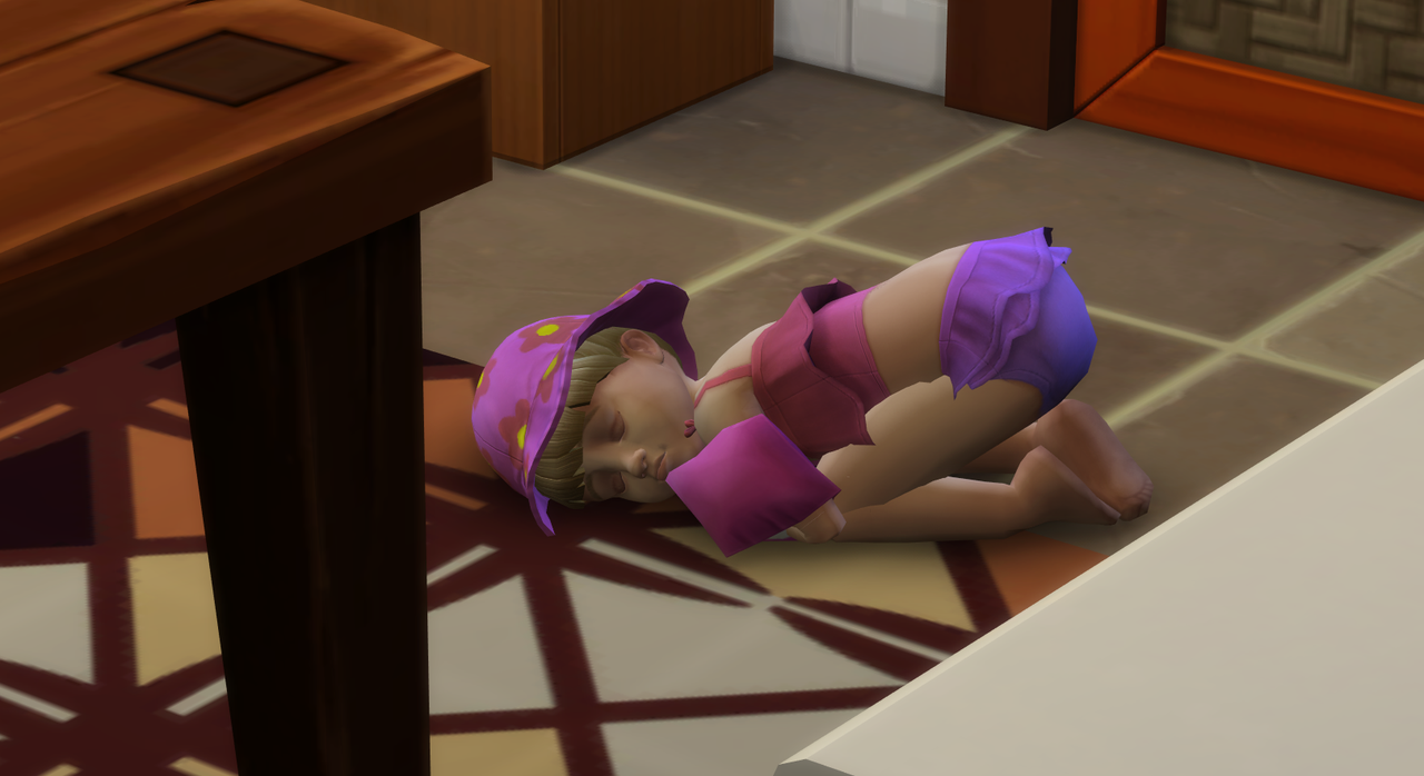 kyra-passed-out-on-the-floor.png