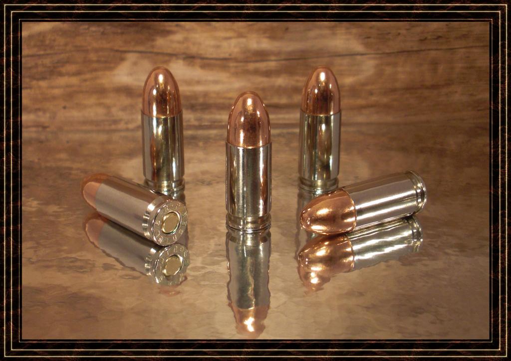 https://i.postimg.cc/VvpDYd7V/9mm-Luger-Nickel-Remington-5s.jpg