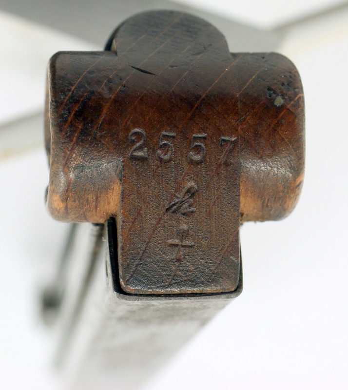 Artillery magazine bottom with stamping