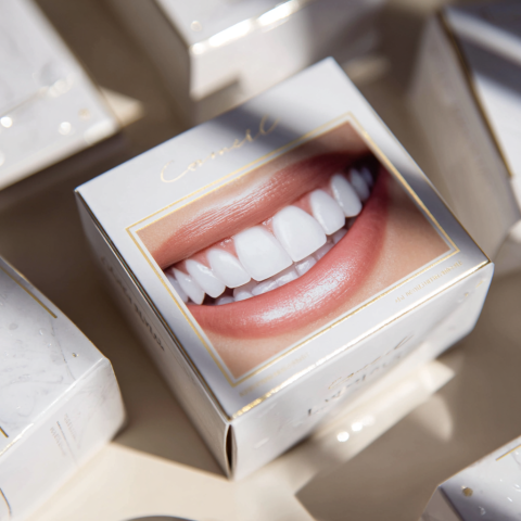 Clinicadentalgranviaalicante-A-close-up-photo-of-a-teeth-whitening-kit-with-8479cef4-7d32-4f42-8339