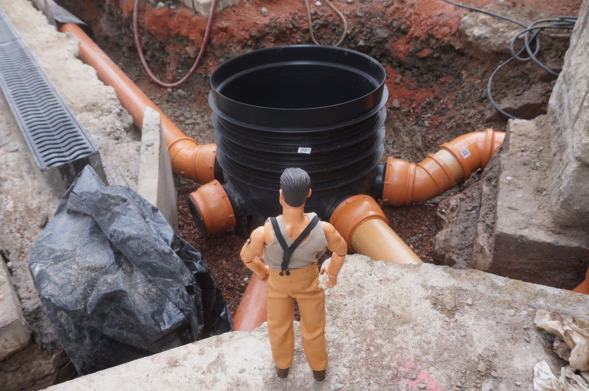 Action Man checking out the underground drainage system. 0181612-A-2704-4-CC0-AB09-83-BC8900-AAC0