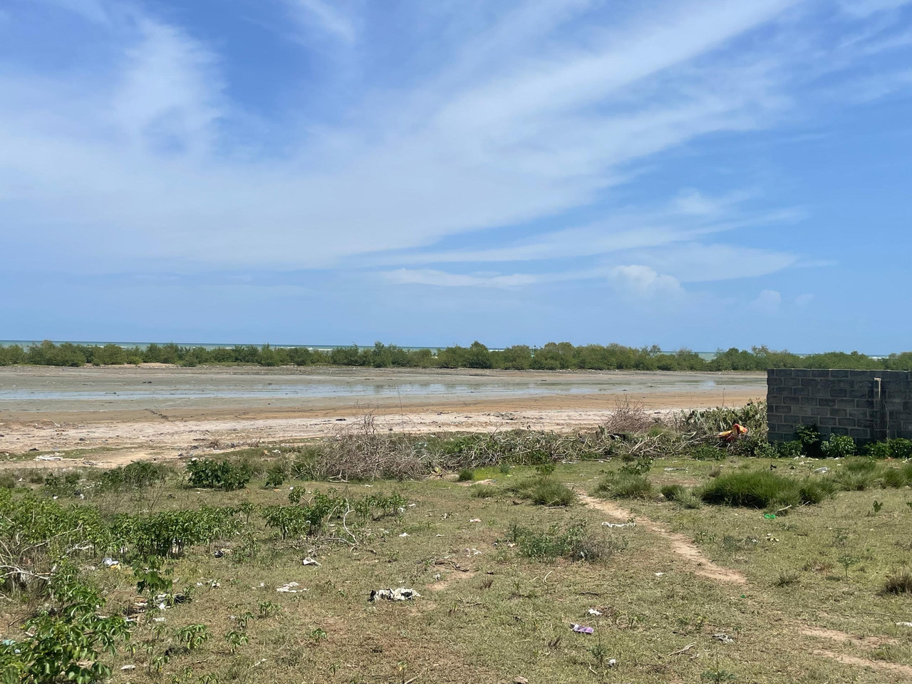 Old Ningo PramPram beachfront land with wall and beach views Ghana