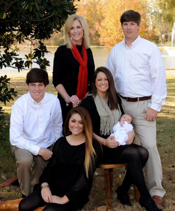 Lynn Fitch with her children and son-in-law