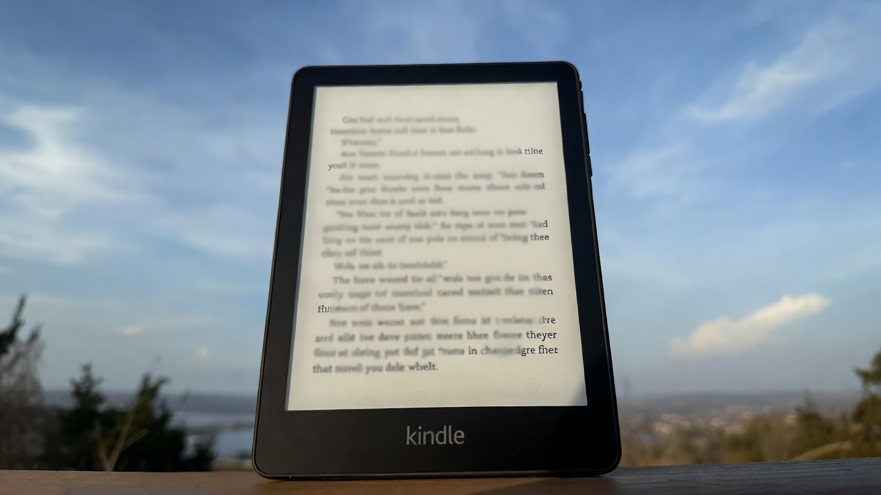 Amazon Kindle Paperwhite 2025 e-reader with glare-free display shown outdoors