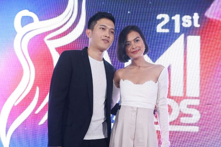 Penyanyi Eva Celia dan drummer Demas Narawangsa hadir dalam perhelatan Anugerah Musik Indonesia (AMI) Awards 2018, yang digelar di Ecovention Ancol, Jakarta Utara, Rabu (26/9/2018).