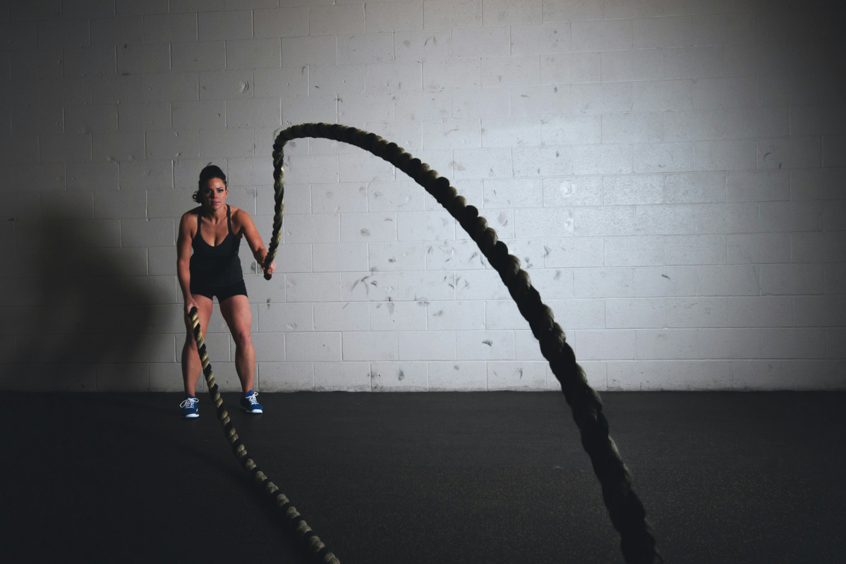 Person exercising with jump rope