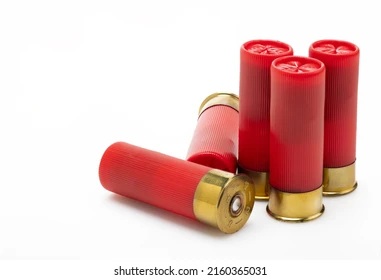 red-shotgun-bullet-shells-on-260nw-2160365031.webp