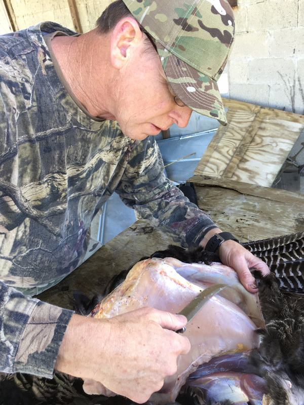 Buck_121_cleaning_turkey_-_2017.jpg