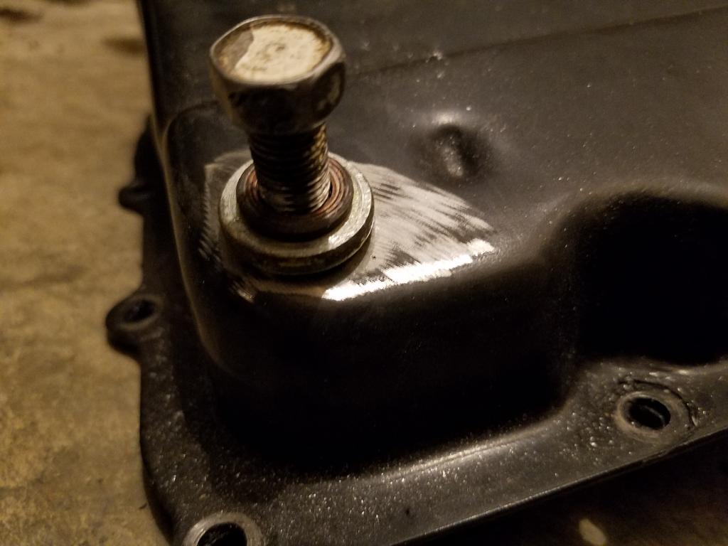 Welding ATF drain plug bung onto pan BobIsTheOilGuy