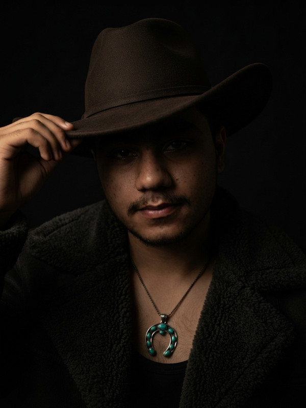 AI-generated example result for the creative-images prompt: Cowboy Hat Turquoise Necklace AI Portrait Prompt | Prompt Craft