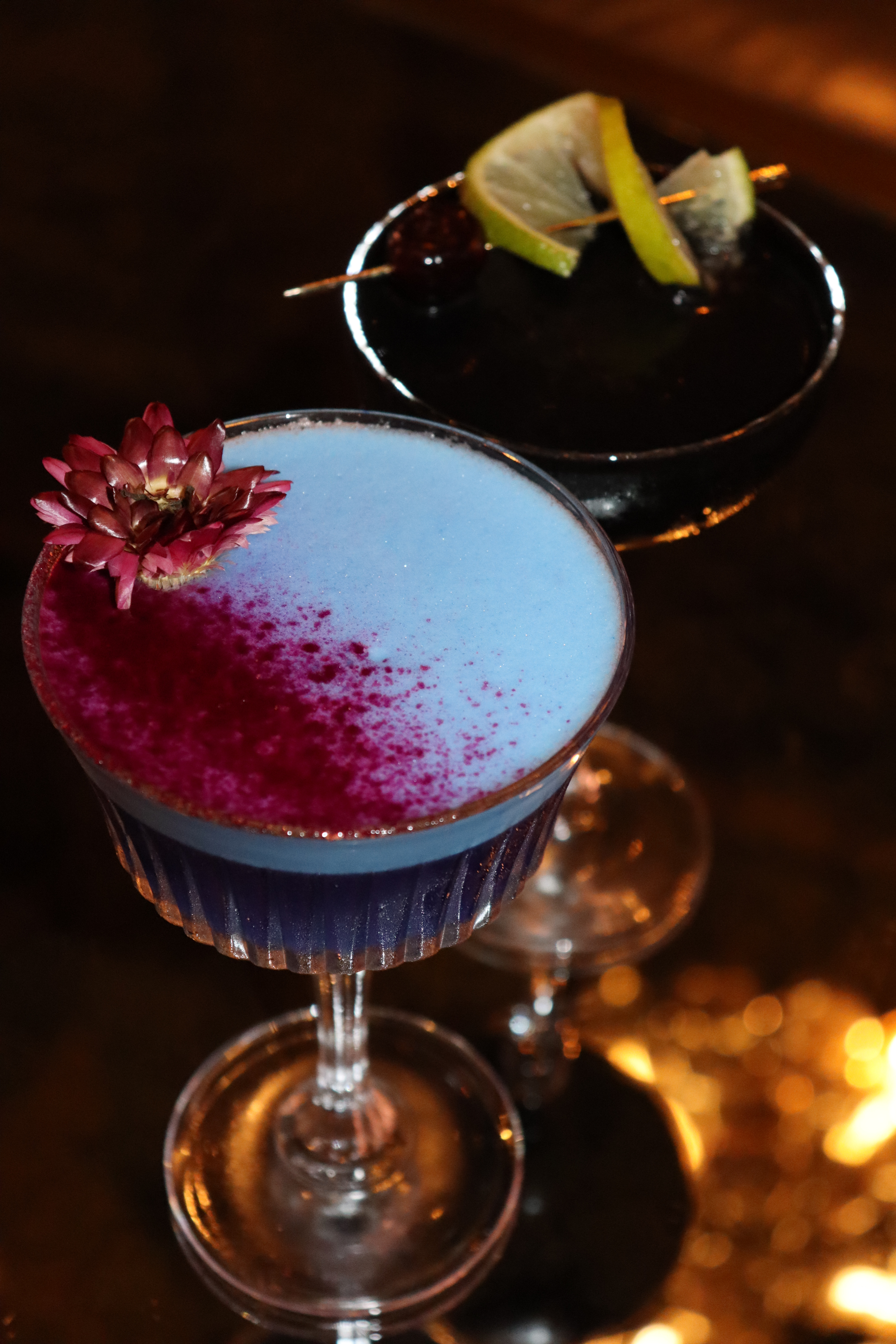 Halloween-inspired cocktails including Witches Brew and Grave Digger Daiquiri