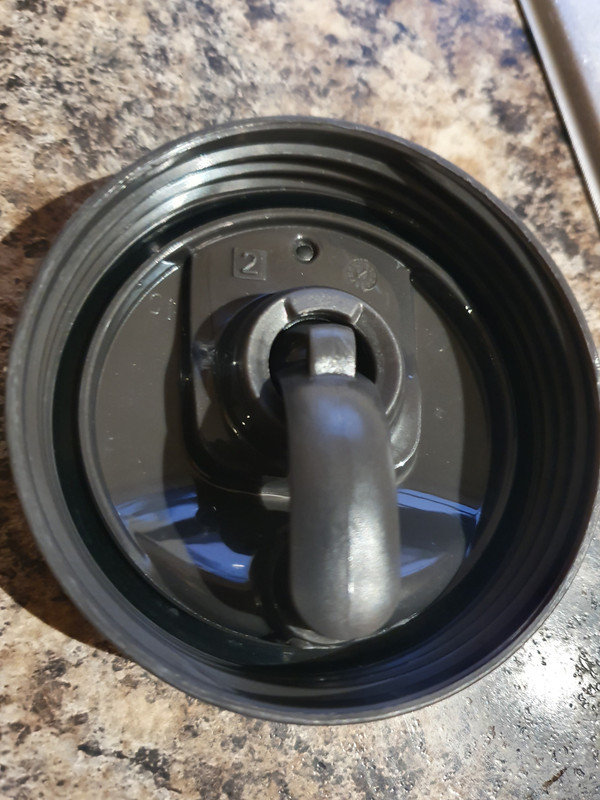 Contigo travel mug. Lid broke (left). Filled out the form on the website.  Honoring the lifetime warranty, they were going to send me a new lid. But  the lids by themselves were