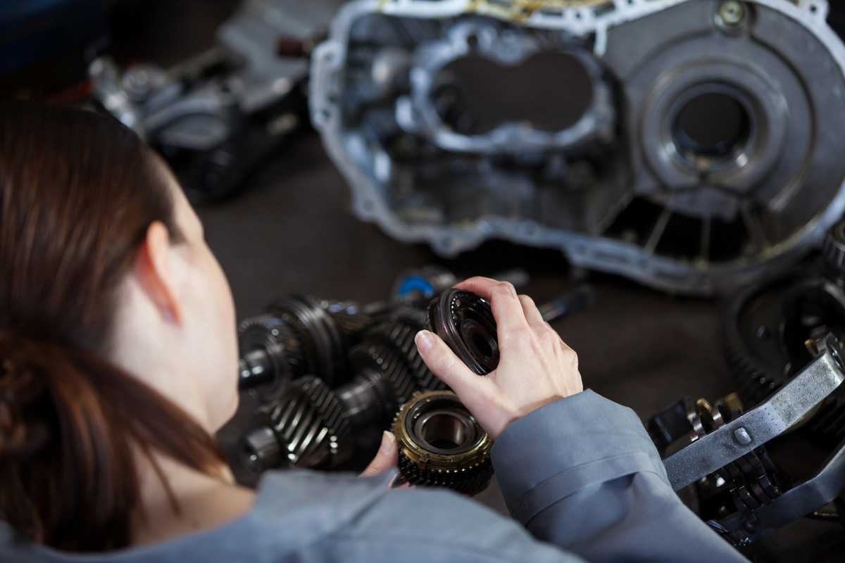 female-mechanic-fixing-gear-1.jpg