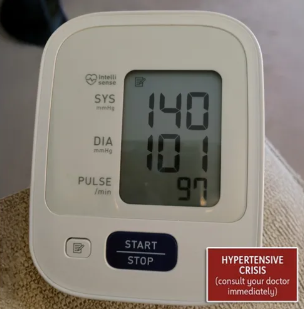 Blood pressure monitor reading 140/101 (hypertensive crisis)