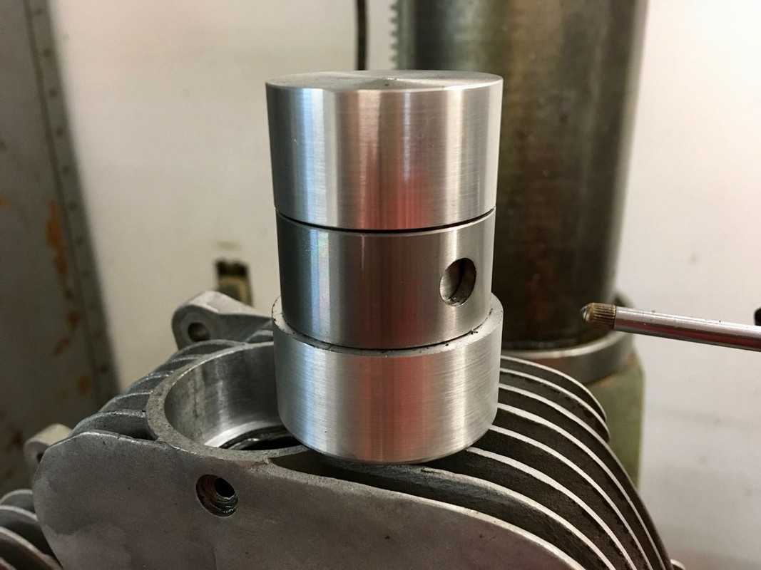T100 exhaust port adapter