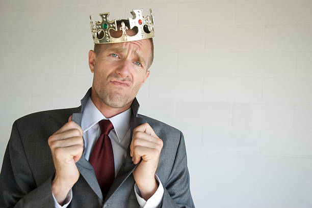 cocky-businessman-king-popping-his-royal-collar.jpg