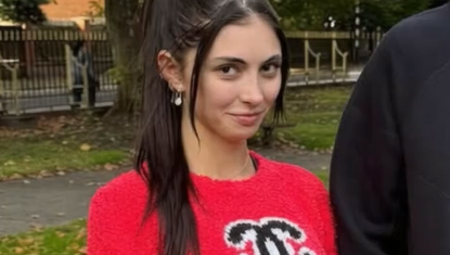 Sara Maughan Flashes Perfect Beautiful Boobs in Red Shirt While Standing with Boyfriend