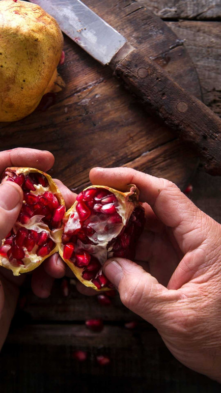 pick out all of the pomegranate seeds from the skin.