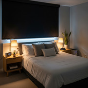 Smart bedroom lighting setup with warm tones and blackout curtains to support better sleep patterns