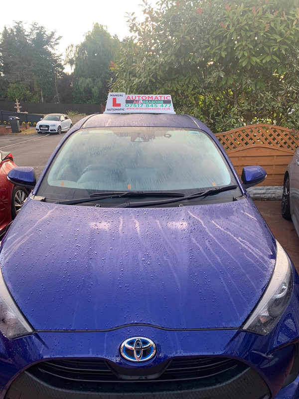 All Seasons Driving School automatic Toyota Yaris with branded roof sign