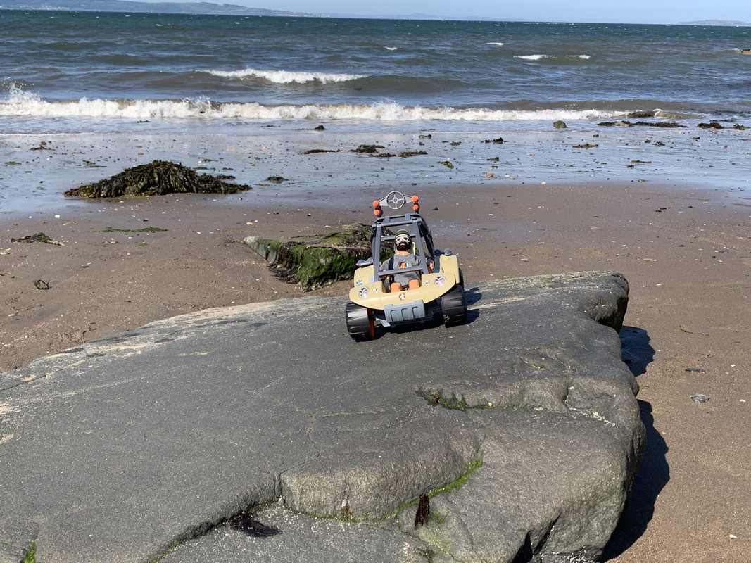 Action Man enjoying a ride out in his Desert buggy on a beach. IMG-5406